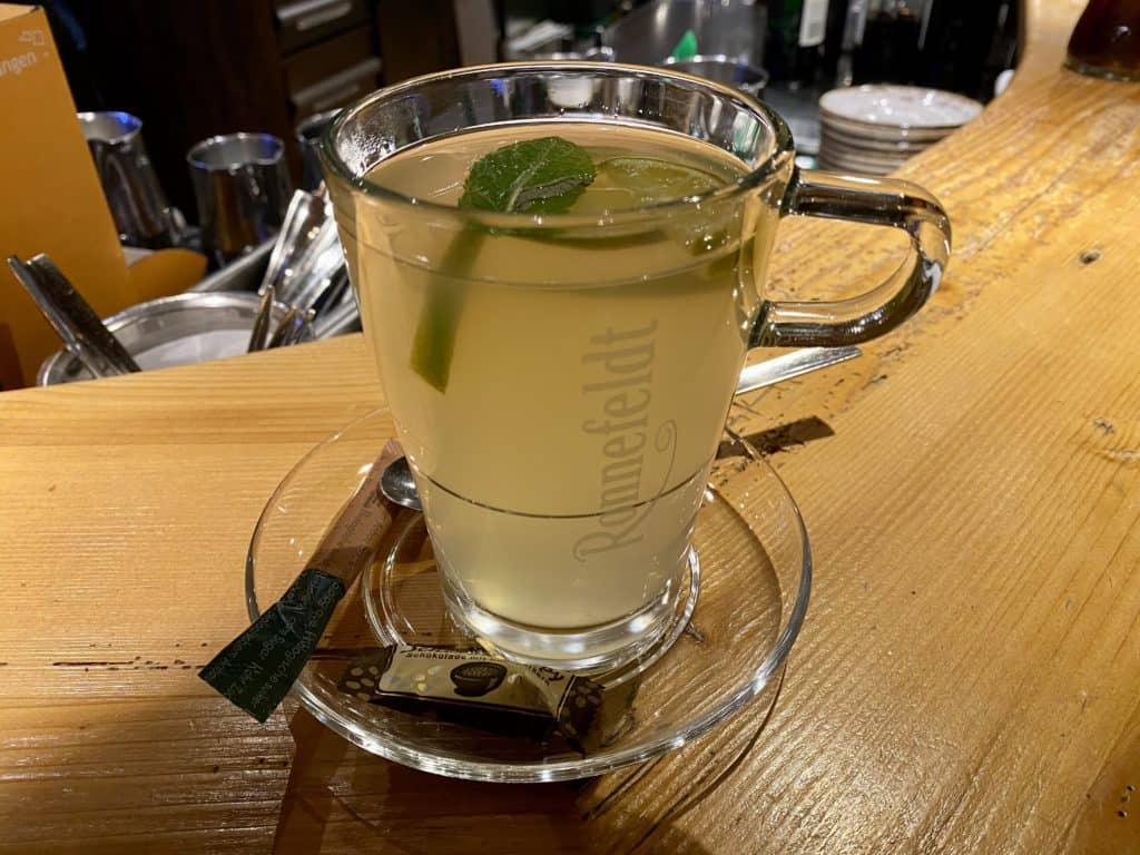 Heisse Inge or Hot Ginger Drink with Lime and Mint at Ammergauer Maxbrau in Oberammergau Germany